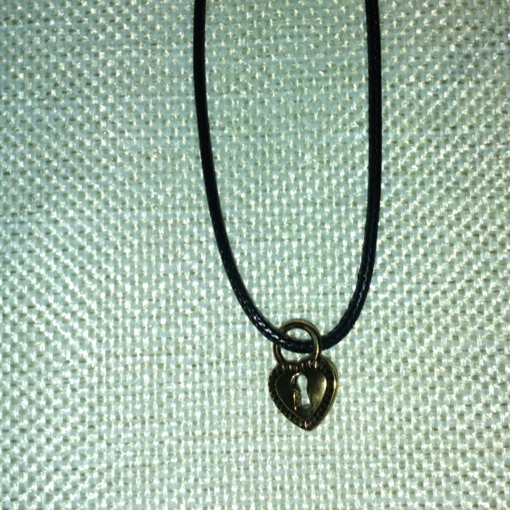 Pretty heart necklace with key hole.